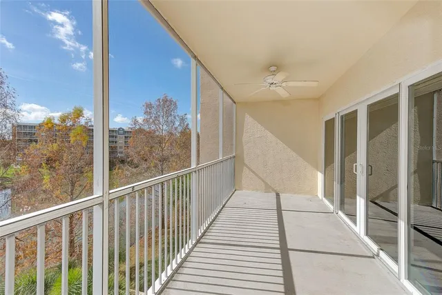 an aerial view of residential houses with city view