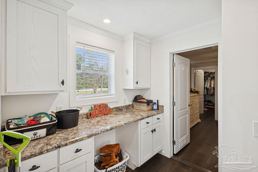 10309 Highway 89 Jay, FL 32565 - Photo 11 of 28 a kitchen with stainless steel appliances granite countertop a sink stove and cabinets