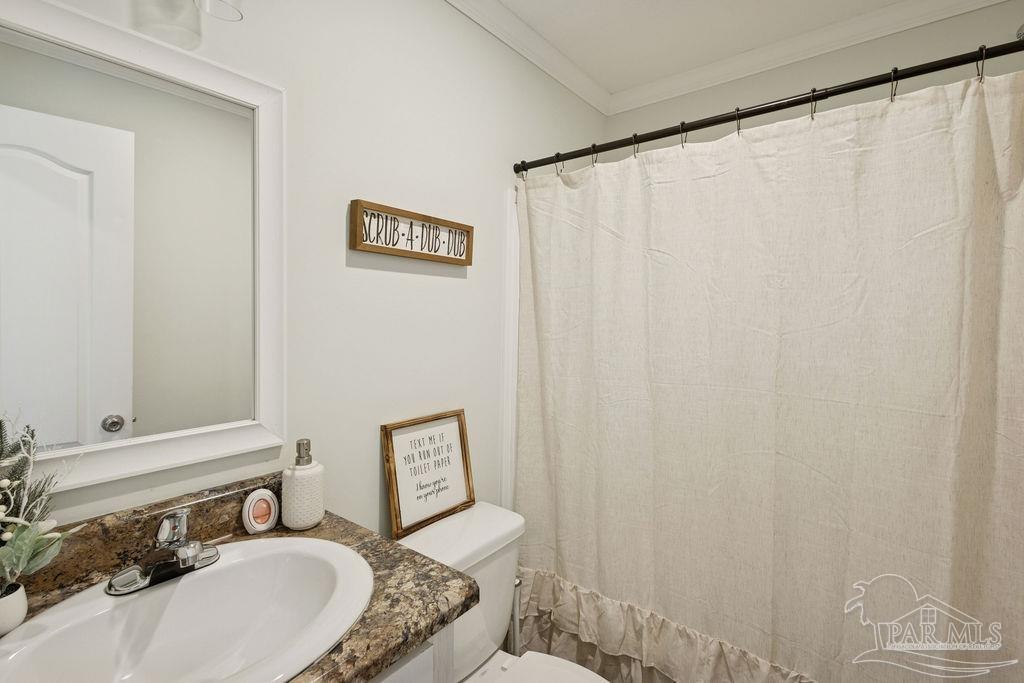 10309 Highway 89 Jay, FL 32565 - Photo 13 of 28 a bathroom with a sink and a mirror