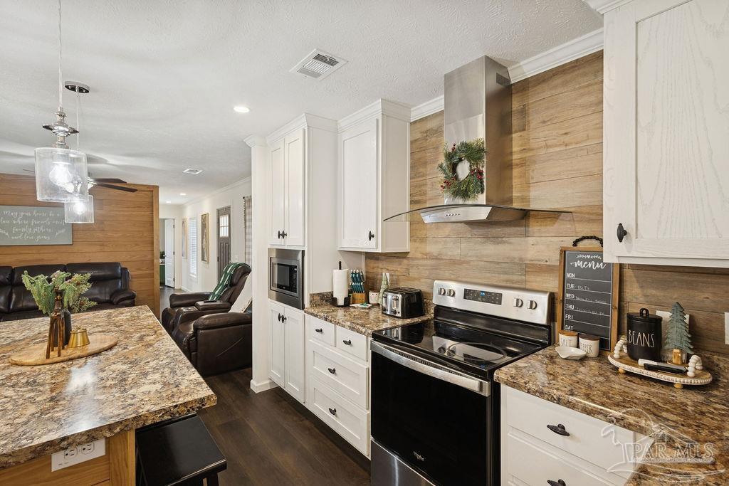 10309 Highway 89 Jay, FL 32565 - Photo 2 of 28 a kitchen with stainless steel appliances granite countertop a sink stove and cabinets