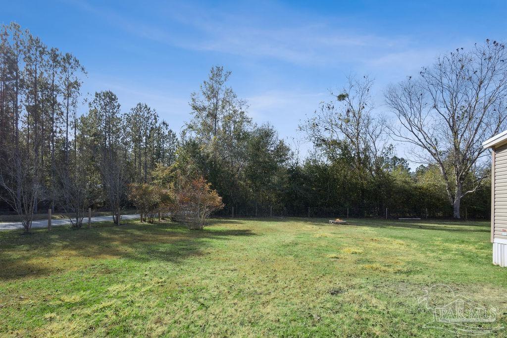 10309 Highway 89 Jay, FL 32565 - Photo 23 of 28 a view of outdoor space with trees all around