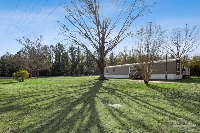 a fire hydrant in the middle of a field