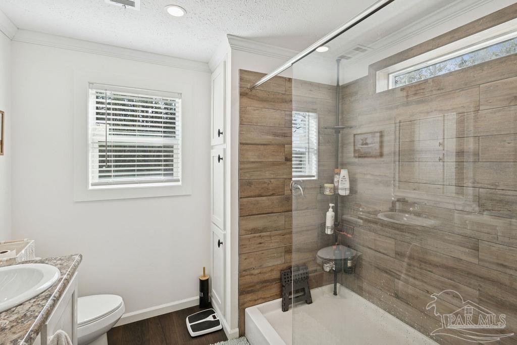 10309 Highway 89 Jay, FL 32565 - Photo 10 of 28 a bathroom with a sink toilet and shower