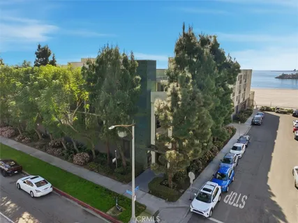 a view of a lake with building in front of it