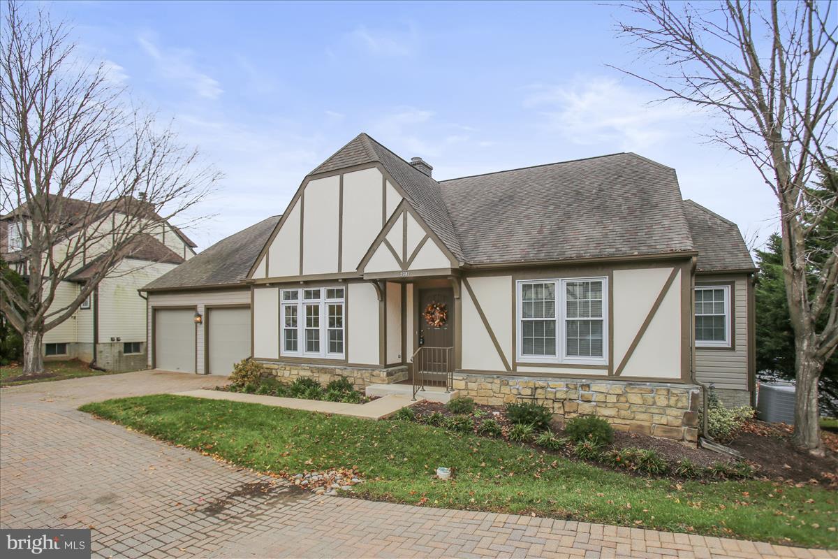 2381 Bear Den Road Frederick, MD 21701 - Photo 1 of 11 a front view of a house with a garden