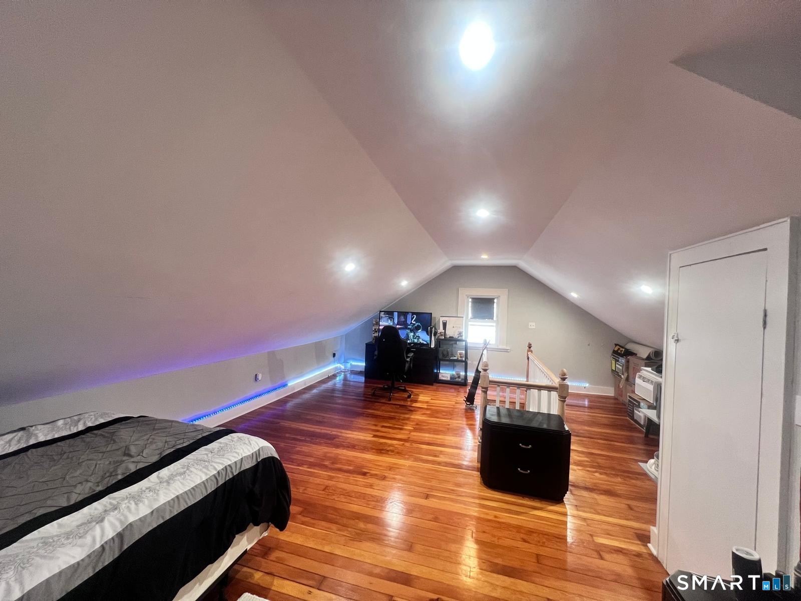 3461 East Main Street Bridgeport, CT 06606 - Photo 29 of 68 a room with furniture and a wooden floor