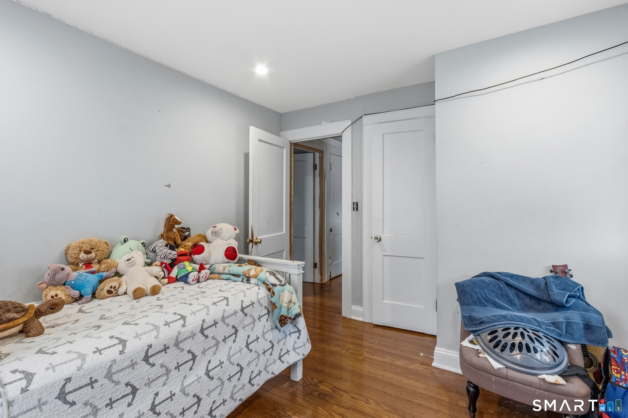 3461 East Main Street Bridgeport, CT 06606 - Photo 44 of 68 a bedroom with a bed and a window