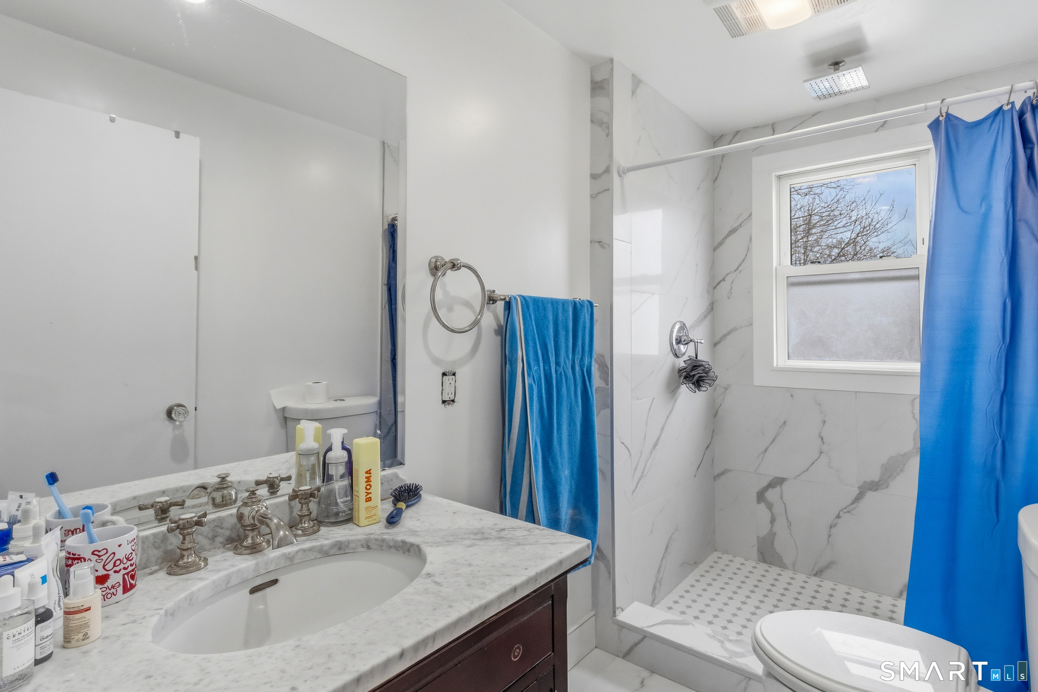 3461 East Main Street Bridgeport, CT 06606 - Photo 59 of 68 a bathroom with a granite countertop sink toilet and shower