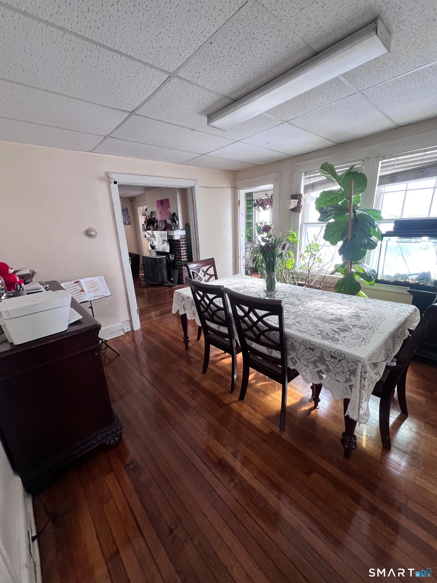 3461 East Main Street Bridgeport, CT 06606 - Photo 7 of 68 a view of a dining room with furniture window and wooden floor
