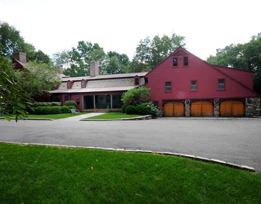 769 Hollow Tree Ridge Road Darien, CT 06820 - Photo 4 of 15 a front view of house with yard and green space
