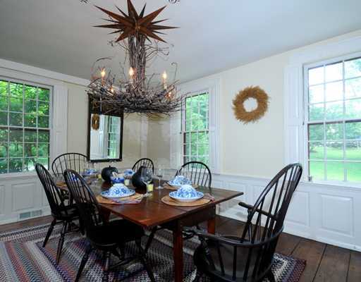 769 Hollow Tree Ridge Road Darien, CT 06820 - Photo 8 of 15 a view of a dining room with furniture window and outside view