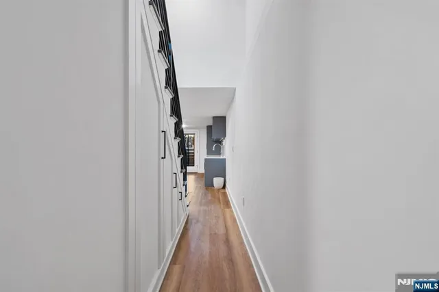 a stove top oven sitting inside of a kitchen