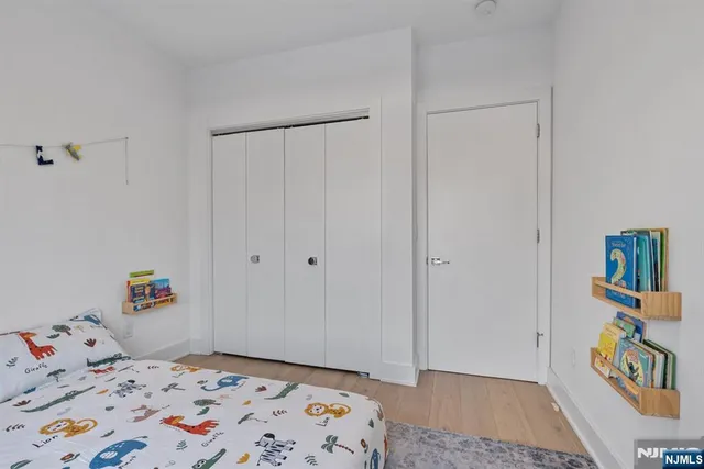 a kitchen with a sink and a refrigerator