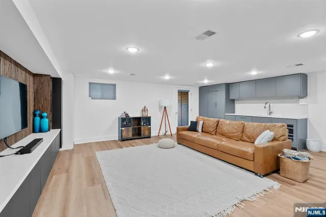 a backyard of a house with barbeque oven