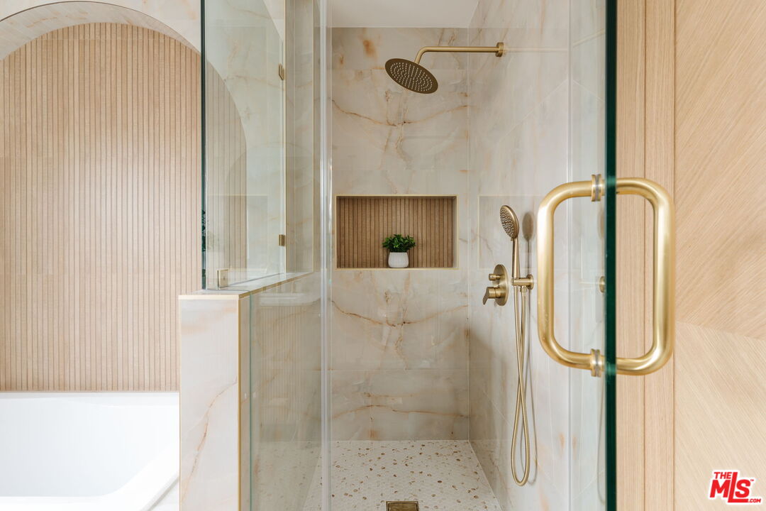 5168 Southridge Avenue Los Angeles, CA 90043 - Photo 39 of 74 a bathroom with a shower