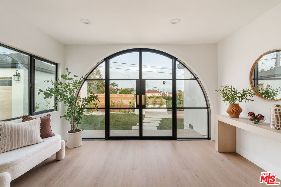 5168 Southridge Avenue Los Angeles, CA 90043 - Photo 4 of 74 a view of a living room and a large window