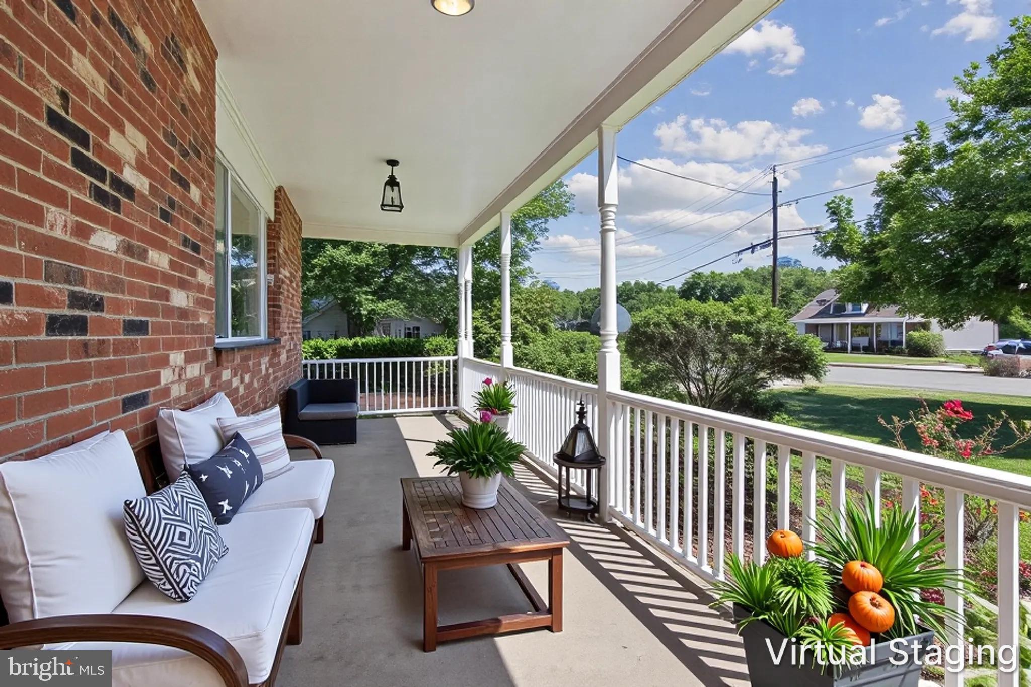 56 Whitehall Road Hamilton, NJ 08690 - Photo 5 of 37 Charming porch with lush greenery.
