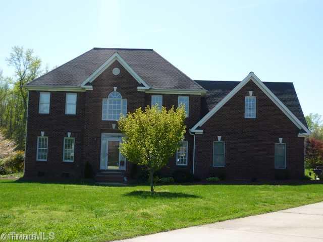 8512 Billet Place Oak Ridge, NC 27310 - Photo 2 of 16 Exterior Front.