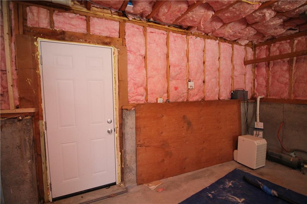 55 Tasker Street Saco, ME 04072 - Photo 17 of 19 Bulkhead Egress, Sump Pump, and...