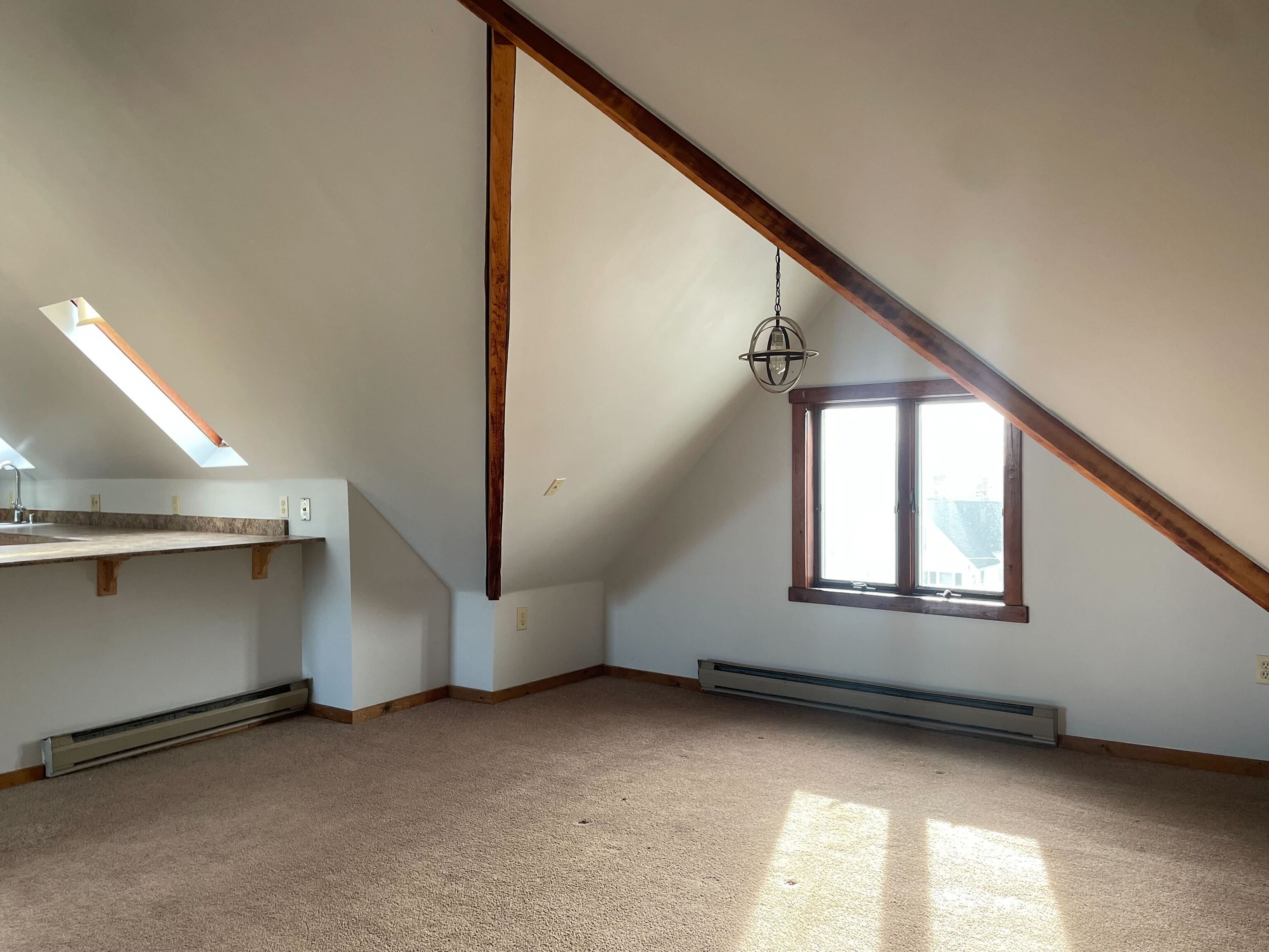 156 Fair Street, Unit 3 Wallingford, CT 06492 - Photo 3 of 10 an empty room with windows