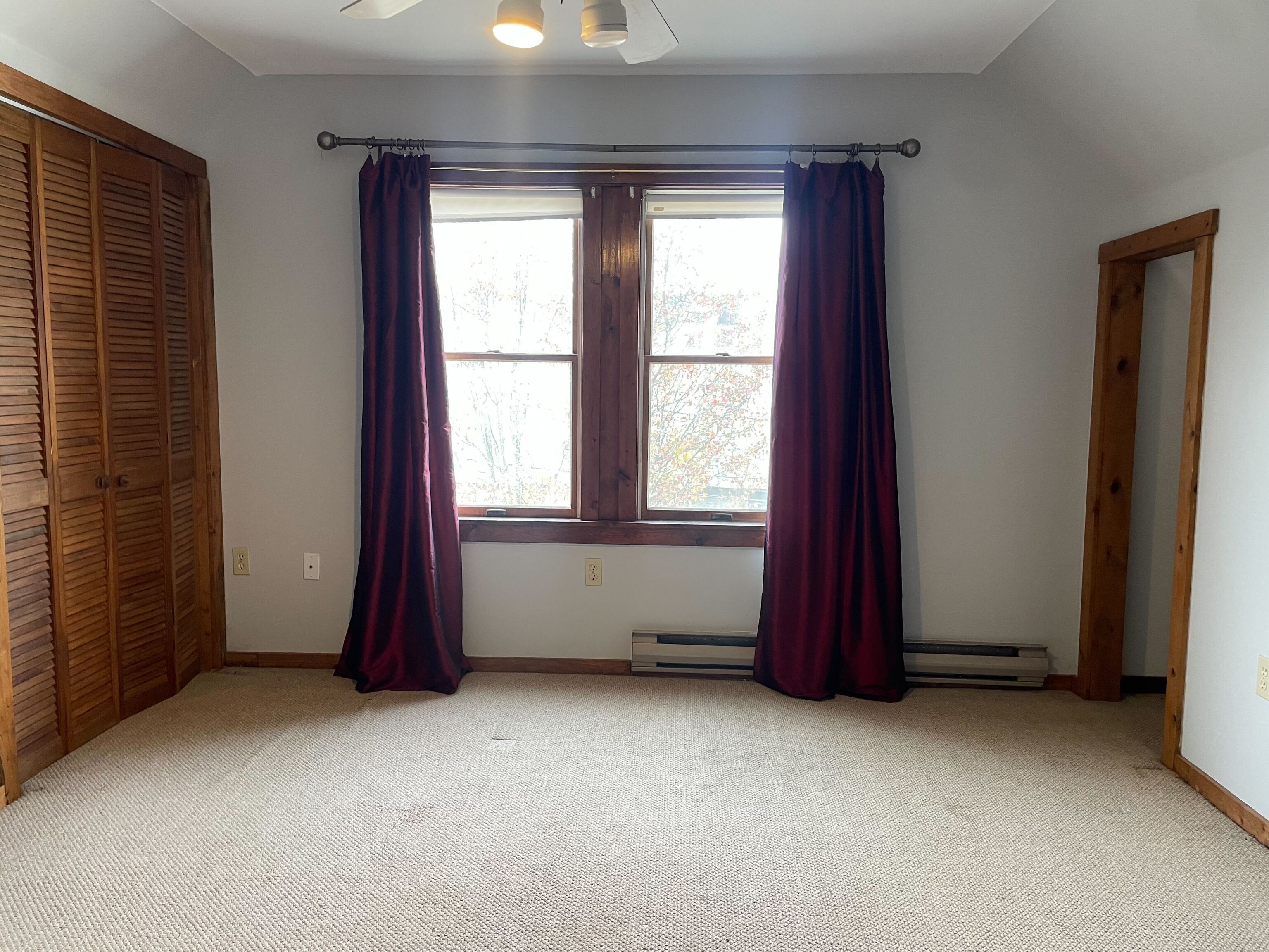 156 Fair Street, Unit 3 Wallingford, CT 06492 - Photo 5 of 10 an empty room with windows