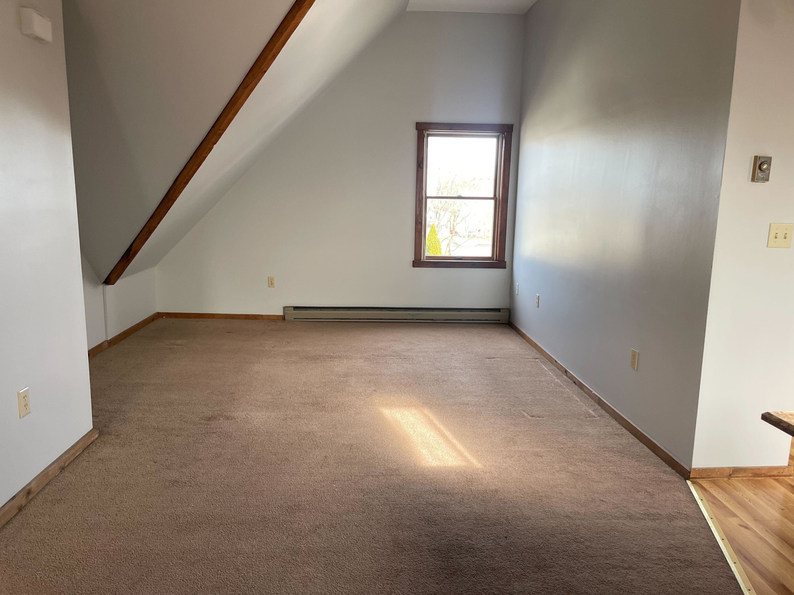 156 Fair Street, Unit 3 Wallingford, CT 06492 - Photo 8 of 10 an empty room with windows