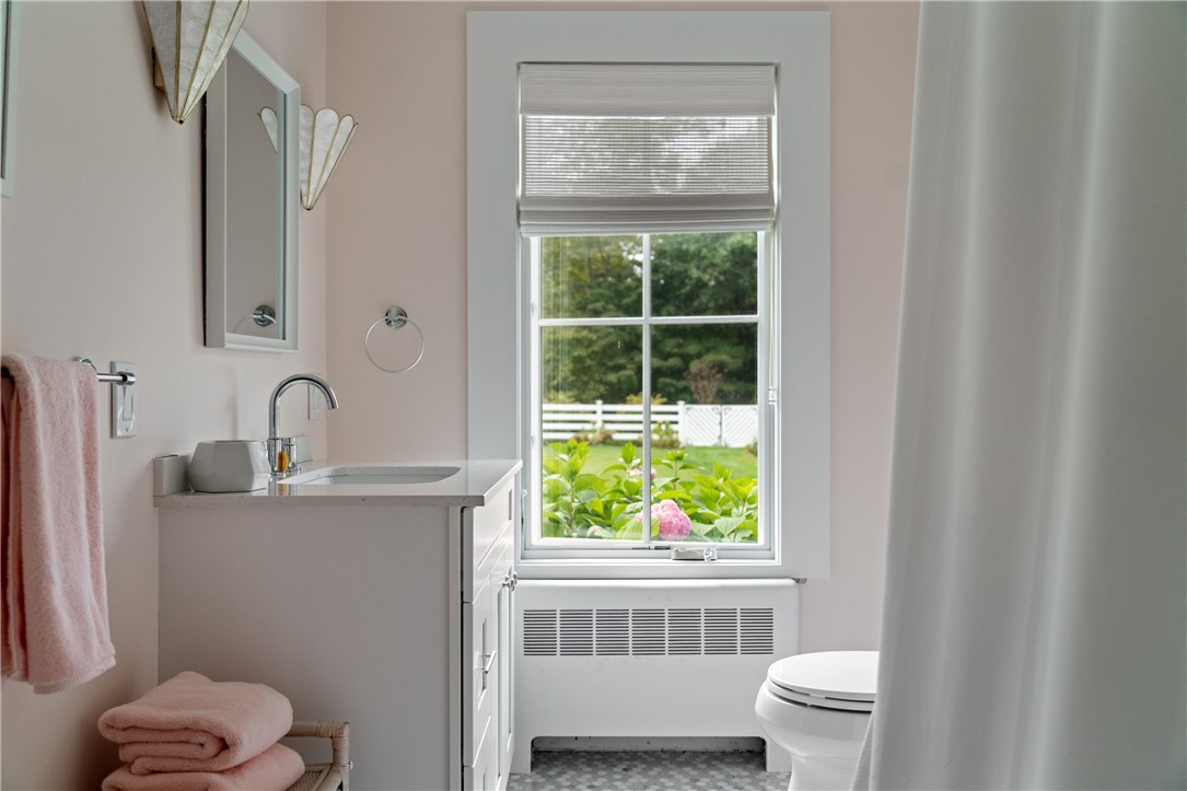 124 Harrison Avenue Newport, RI 02840 - Photo 23 of 29 Full hallway bathroom with tub/shower combo.