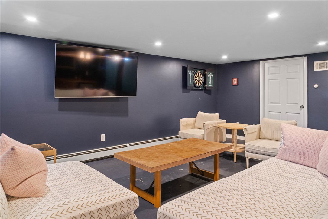 124 Harrison Avenue Newport, RI 02840 - Photo 24 of 29 Finished lounge space in basement.