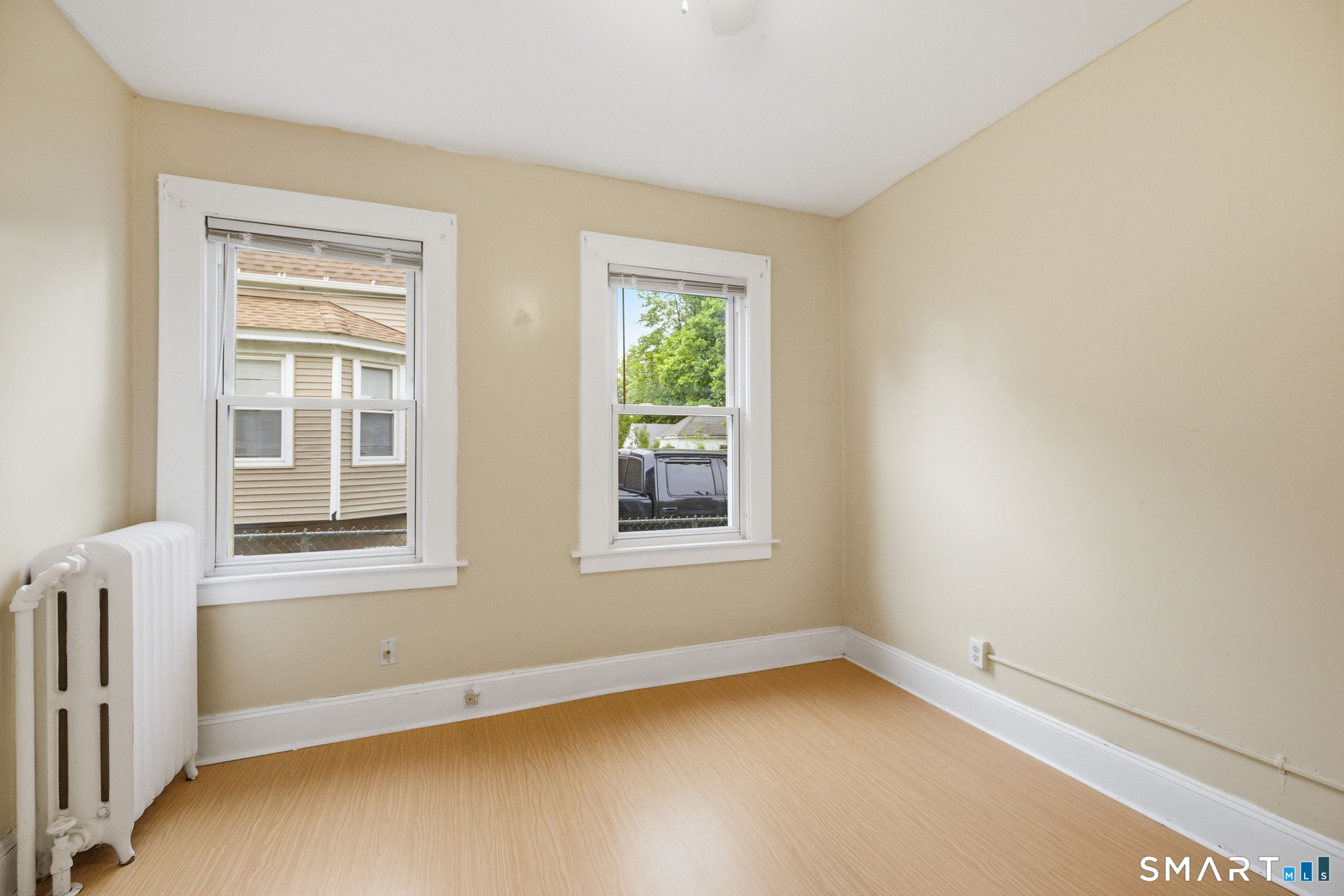 76 Harold Street Hartford, CT 06112 - Photo 8 of 12 an empty room with a window