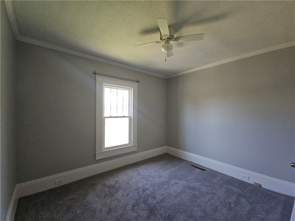208 Pendleton Street Pickens, SC 29671 - Photo 18 of 30 This tranquil room offers a bright window and soft carpeting for ultimate comfort.