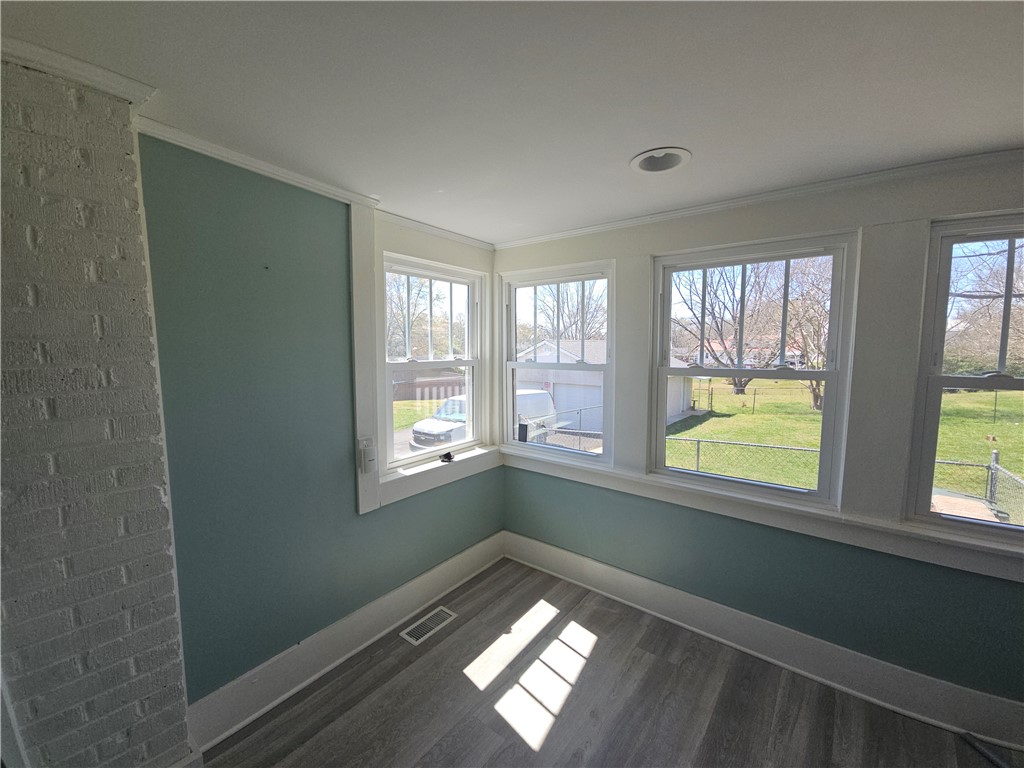 208 Pendleton Street Pickens, SC 29671 - Photo 22 of 30 Bright room with natural light and durable flooring for comfortable living.
