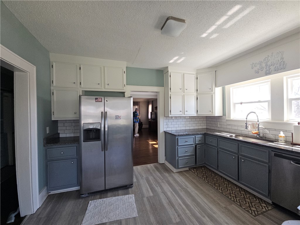 208 Pendleton Street Pickens, SC 29671 - Photo 10 of 30 This spacious kitchen offers ample cabinet storage and a practical layout.