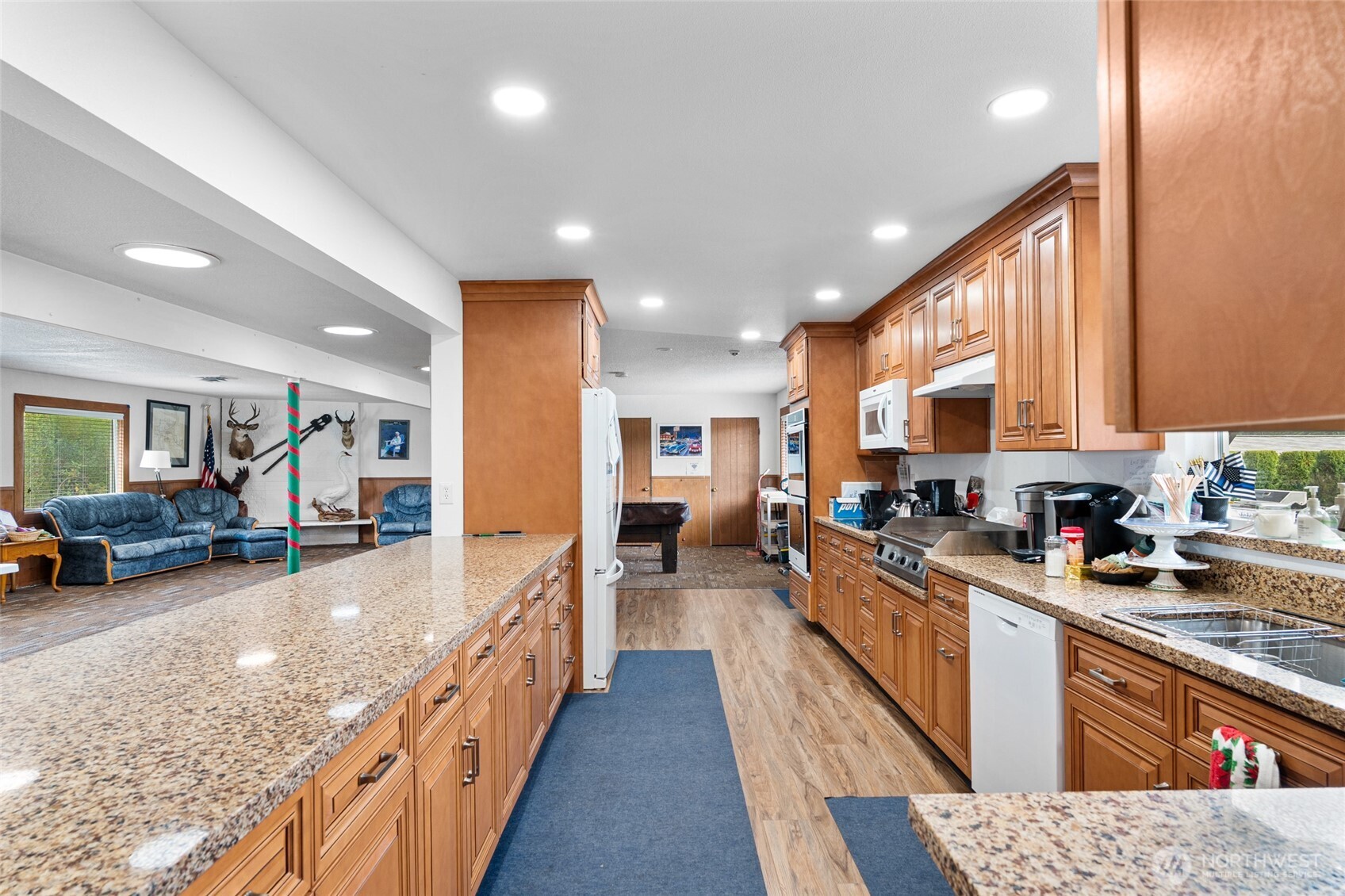 23825 15th Avenue Southeast, Unit 427 Bothell, WA 98021 - Photo 32 of 38 a large kitchen with stainless steel appliances lots of counter top space