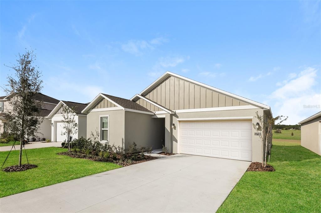 a view of a back yard of the house