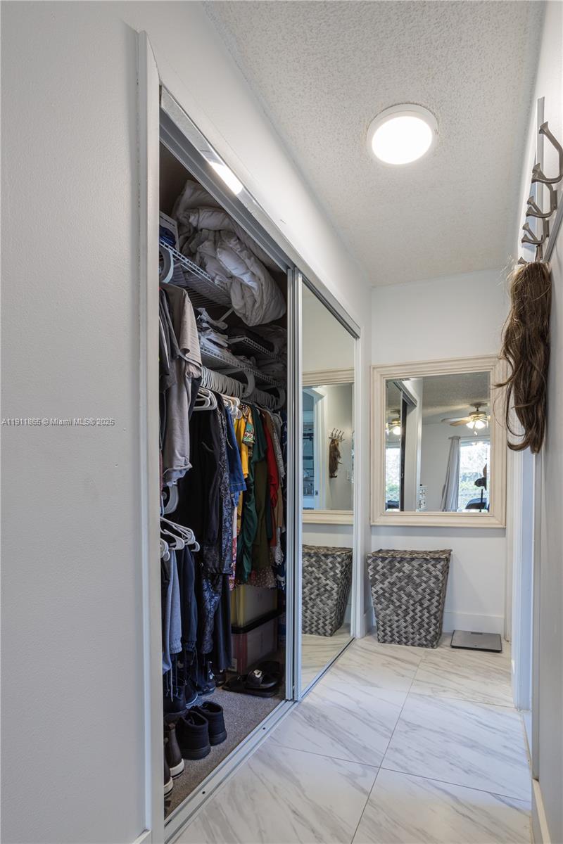 7940 Northwest 9th Street Margate, FL 33063 - Photo 16 of 21 a view of a livingroom with closet and a window
