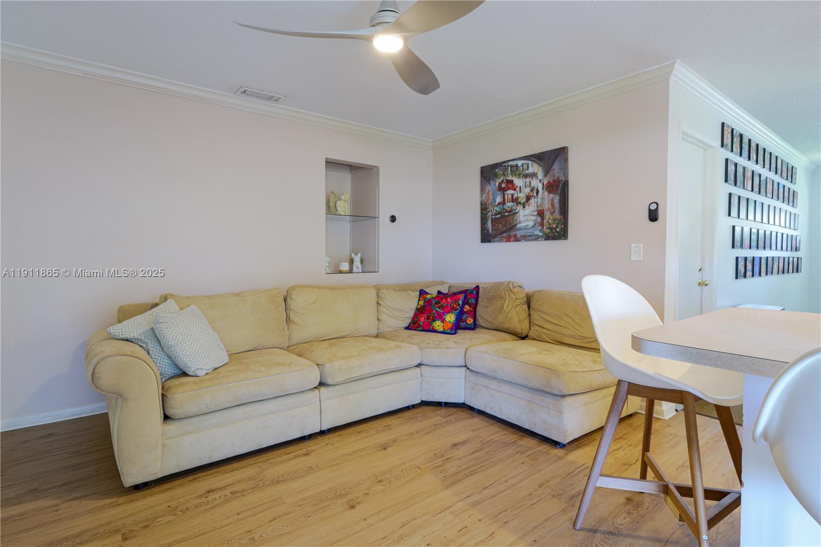 7940 Northwest 9th Street Margate, FL 33063 - Photo 6 of 21 a living room with furniture and a wooden floor