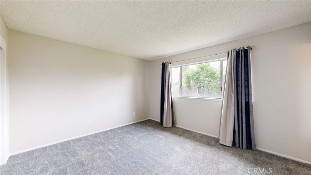 3415 Valencia Hill Drive Riverside, CA 92507 - Photo 21 of 48 an empty room with windows