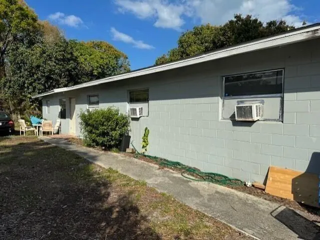 a backyard of a house with lots of green space