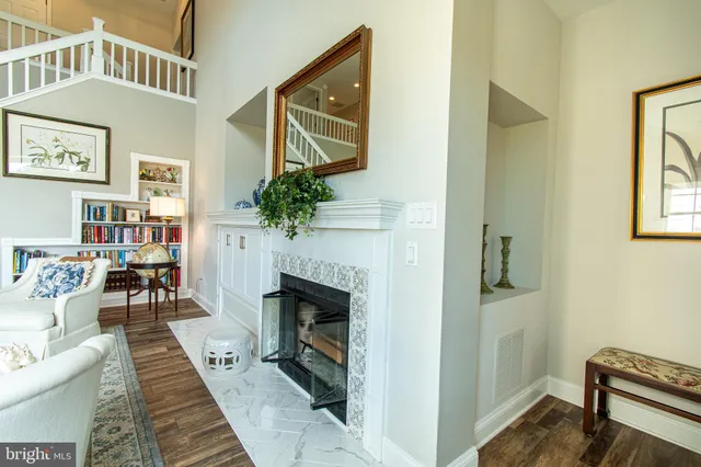 a bedroom with a bed and a dresser in it