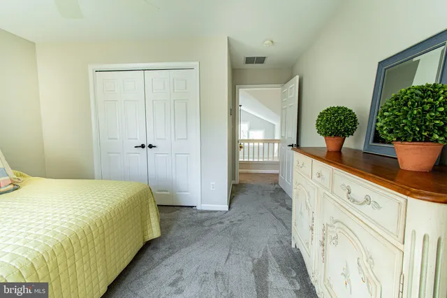 a balcony with furniture and wooden floor
