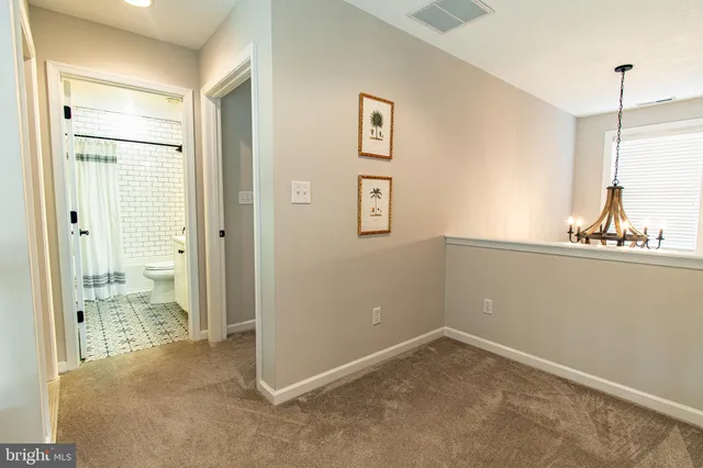 a view of balcony with furniture