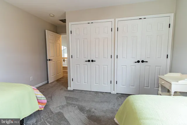 a view of a lake with furniture