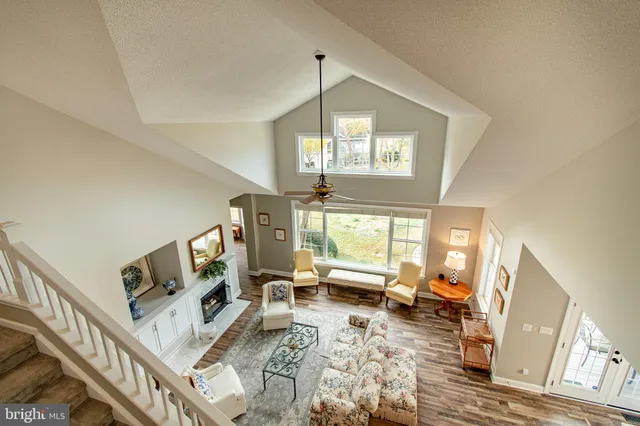 a view of a chairs and table in the balcony