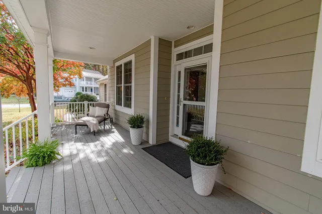 an aerial view of a house with a big yard