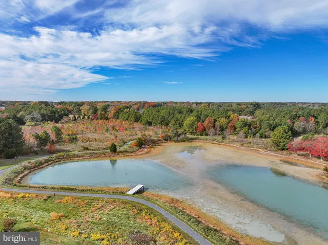 a lake view with a wooden floor and lake view