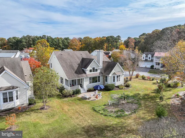 a lake view with a wooden floor and lake view