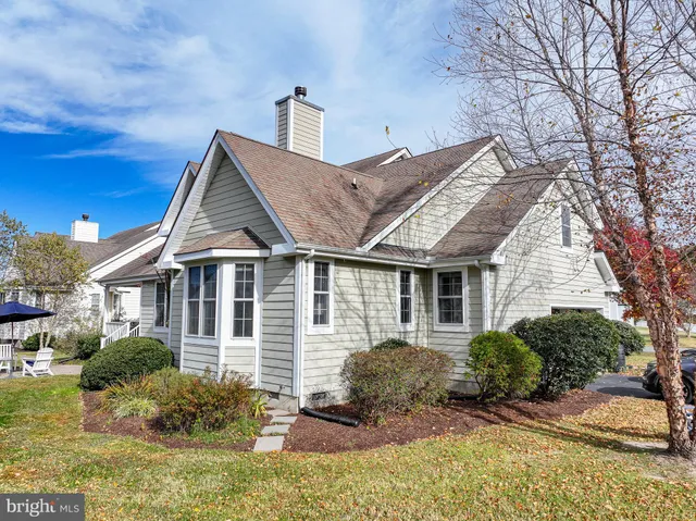 a picture of a bathroom with a shower