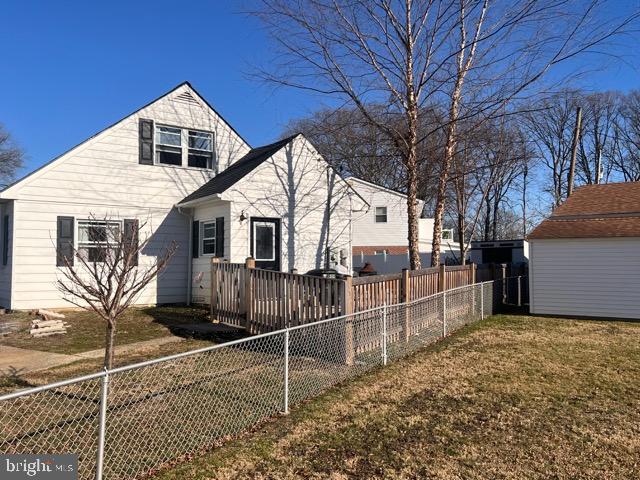 3703 Holly Grove Road Middle River, MD 21220 - Photo 20 of 40 a view of a house with a yard