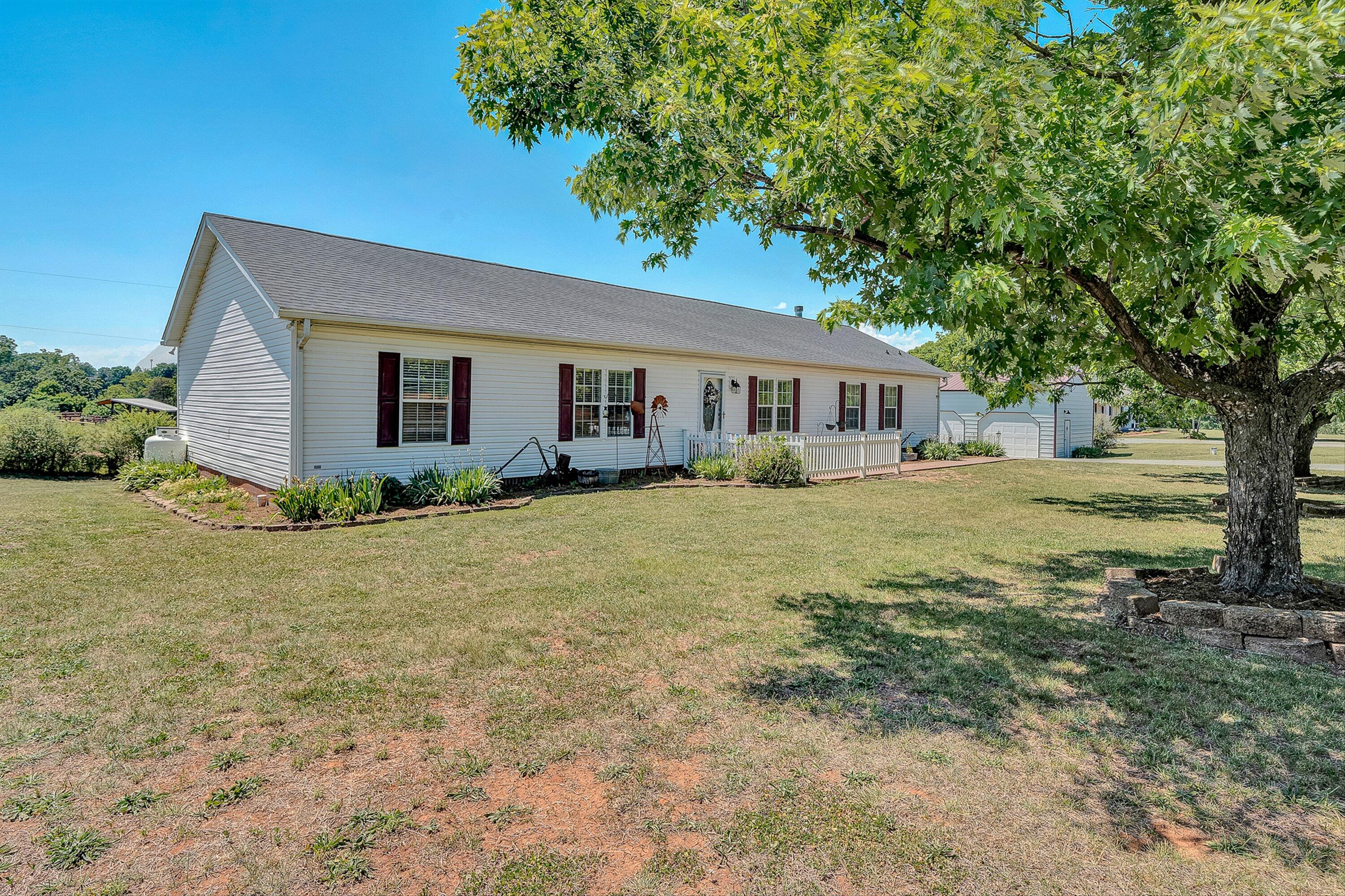 159 Simmons Creek Road Union Hall, VA 24176 - Photo 2 of 55 a house view with a garden space