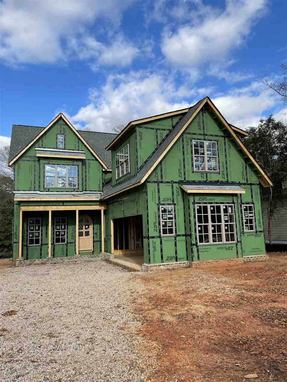 3414 Lewis Farm Road Raleigh, NC 27607 - Photo 6 of 12 The brick on the front of the house will be painted White Brick will go up on the front soon.
